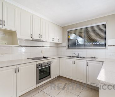 Comfortable Family Home in Sought-After Centenary Heights - Photo 6