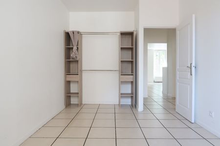 Location Appartement 4 pièces 77m² ST ETIENNE 42000 - Photo 4
