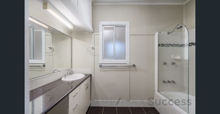 Charming Lowset Home in Convenient Newtown Location - Photo 4