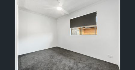 Newly Renovated | Modern Top Floor, 2 Bedroom Unit with Garage - Photo 2