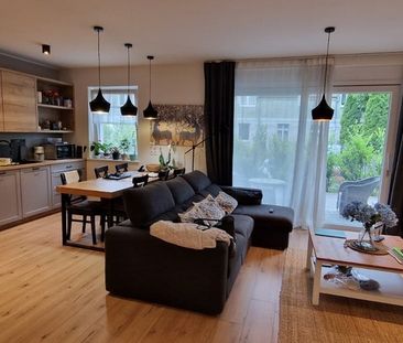 Przestronne mieszkanie z ogrodem i garażem - Zdjęcie 2