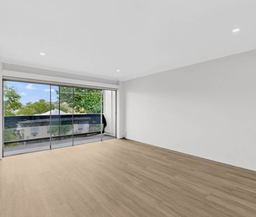 Stylish 2-Bedroom Unit with Balcony & Modern Comforts - Photo 1