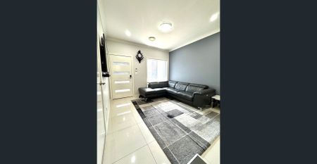 FOR RENT – Spacious Modern Family Home with Full Backyard Deck - Photo 2