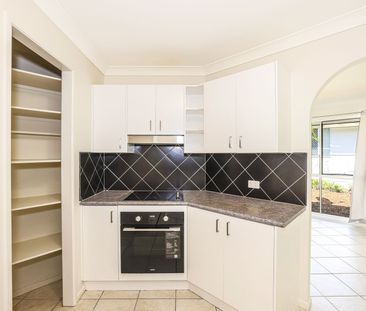 LOW SET BRICK AND TILE HOME IN SOUGHT AFTER RED BEACH - Photo 2