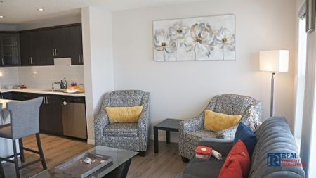 10799 Cityscape Drive NE | Townhouse | 3-bedroom, 2.5-bathroom | Double Garage - Photo 2