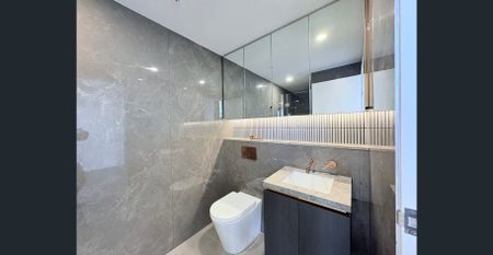 Modern Luxury Living in TRIO | Near-New 2B 2B 1CP Apartment - Photo 2