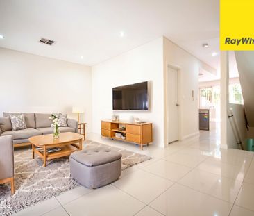 CONTEMPORARY THREE BEDROOM TOWNHOUSE IN MOST SOUGHT AFTER LOCATION - Photo 3
