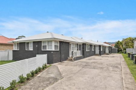 Stylishly renovated coastal retreat - Photo 4