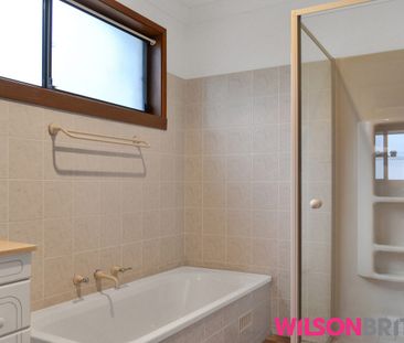 Solid Three Bedroom Family Home with Big Backyard on 815sqm - Photo 4