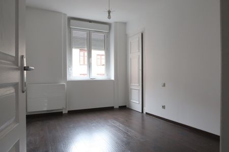 Location Appartement 3 pièces 65m² ST ETIENNE 42000 - Photo 3