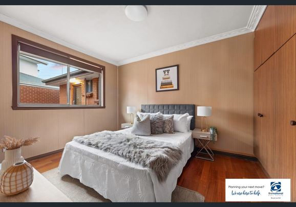 Spacious Three-Bedroom Unit - Photo 1