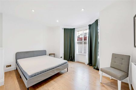 A well presented two bedroom basement flat located in the heart of Ealing walking distance to Ealing Broadway station. - Photo 3