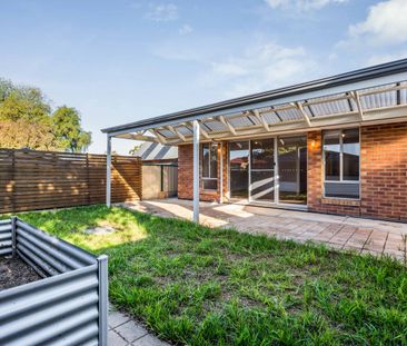 Spacious, Low-Maintenance Living in a Prime Location - Photo 5