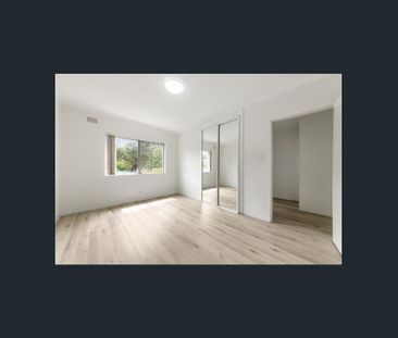 Centrally Located Air Conditioned Two Bedroom Unit in a Parkside Lo... - Photo 3