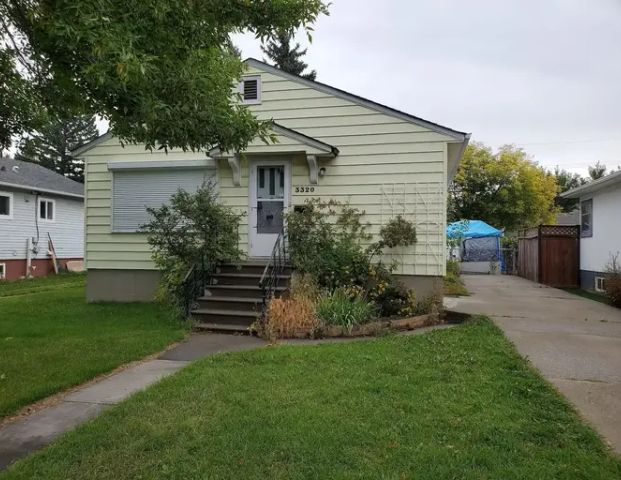 2 Bed 1 bath Inner City FULL House with Laundry in basement, fenced yard | 3320 1 Street Northwest, Calgary - Photo 1