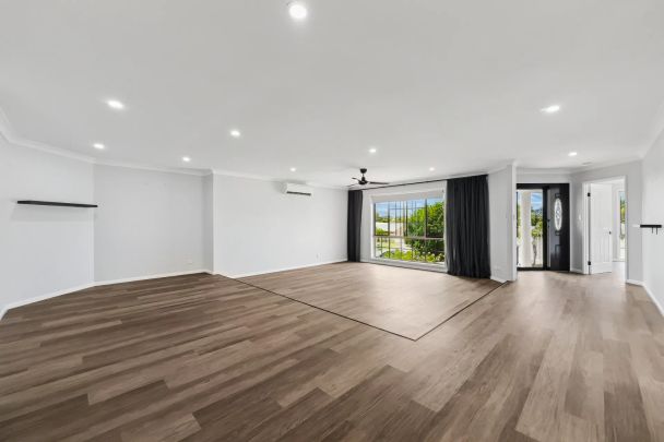 Spacious family home with pool in the heart of Elanora - Photo 1