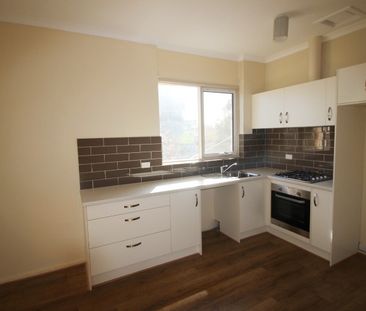 Open the Door to Trendy, Low-Maintenance Living in South Plympton - Photo 1