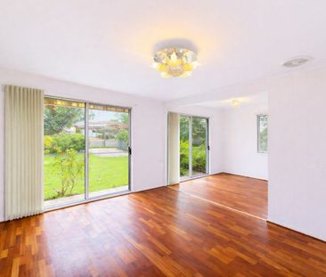 GENEROUS 3-BEDROOM BRICK HOME READY TO MOVE IN - Photo 1