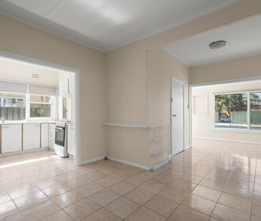 SPACIOUS 3-BEDROOM HOME with HUGE YARD and REAR STREET ACCESS - Photo 2