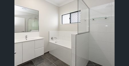 Modern Family Living Starts Here: Brand New Four-Bedroom Build! - Photo 3