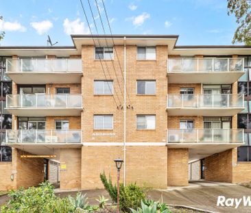 Renovated top-floor unit positioned at the rear of the complex, wal... - Photo 4