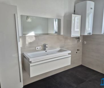 Terrassen-Wohnung im Erdgeschoss mit Einbauküche und bis zu zwei PK... - Photo 5
