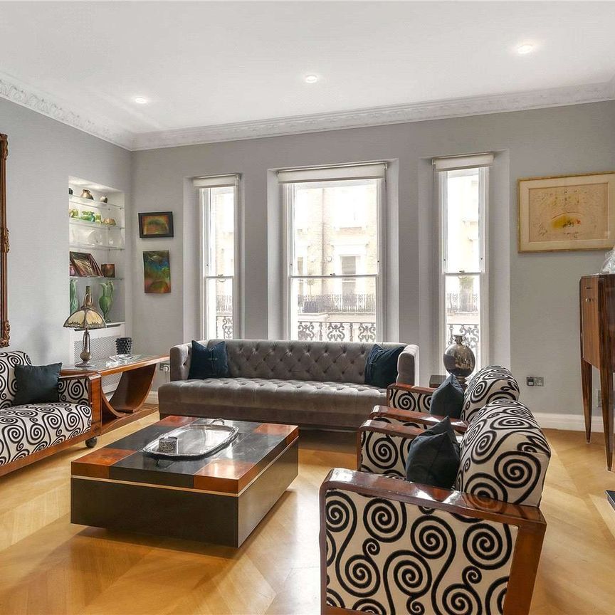 A 'key' Grade II listed part stucco fronted house, located just off Onslow Gardens. - Photo 1