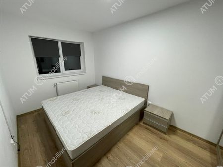 De inchiriat apartament cu 3 camere decomandate balcon si loc parcare in zona Magnolia din Sibiu - Photo 2