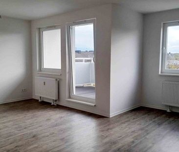 Moderne lichtdurchflutete DG-Wohnung! - Foto 1