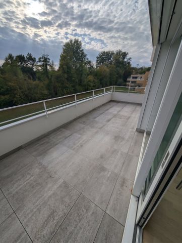 REPRISE DE BAIL - Appart. de 54m2 + gde terrasse et parking - Photo 4