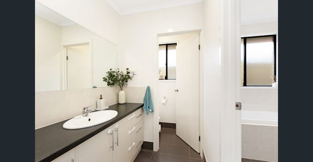 Modern Family Home with Two Living Areas & Gorgeous Outdoor Space - Photo 1