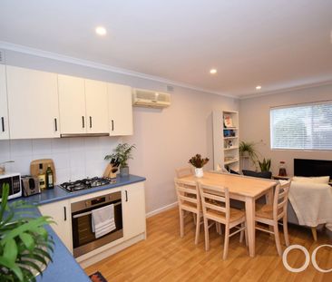 Open the Door To Coastal Convenience with a Private Courtyard Retreat - Photo 4