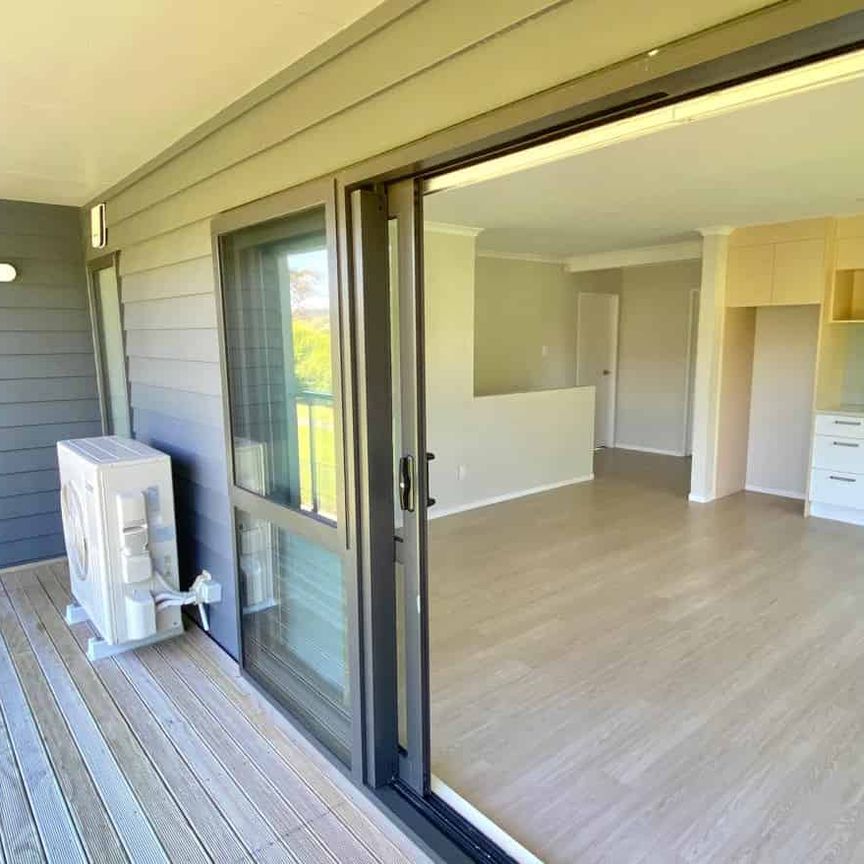 Elevated, Secure Living by the Park - Photo 1