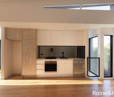 NEWLY BUILT! ARCHITECTURAL TOWNHOUSE IN BRUNSWICK AWAITS YOU - Photo 2