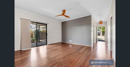 IMMACULATE AND WELL APPOINTED THREE BEDROOM HOME - Photo 3