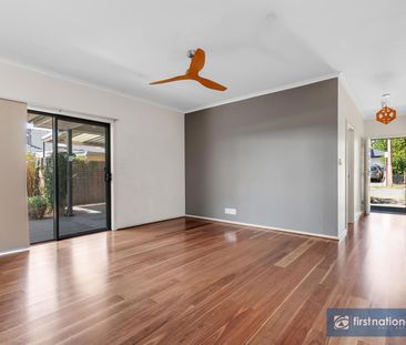 IMMACULATE AND WELL APPOINTED THREE BEDROOM HOME - Photo 3