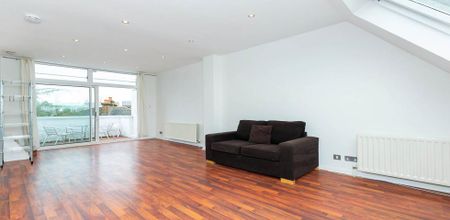 Stunning modern split level 3 bed with a private roof terrace in camden square - Photo 3