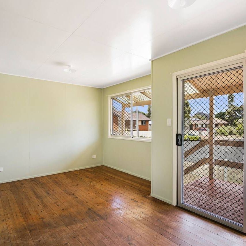 This tidy 2-bedroom unit is now available, featuring a generous fully fenced yard. - Photo 1