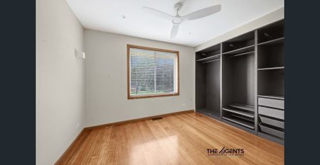 Stylish Renovated Home with Spacious Yard and Large Garage - Photo 4