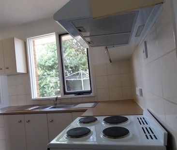 Conveniently Located updated Three-Bedroom Home with Fully Fenced Yard - Photo 6