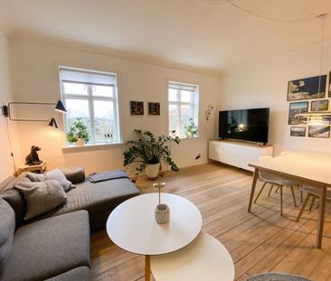 Hyggelig 2 værelses lejlighed med udsigt til østre anlæg - Photo 1