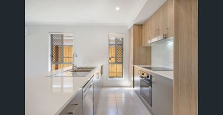 A modern sanctuary in a peaceful, family-friendly pocket, this beautifully finished 4-bedroom home delivers effortless living with a touch of luxury. - Photo 3