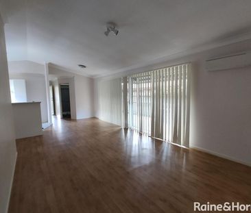 Spacious 3-Bedroom Home in a Great Location - Photo 1