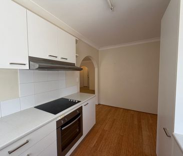 Updated & Centrally Located - Photo 6