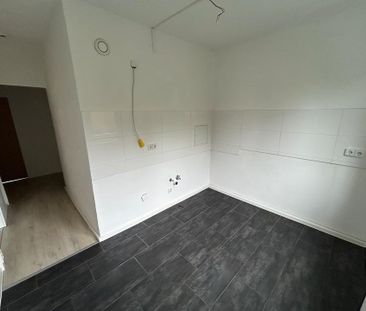 Geräumige 3-Zimmer-Erdgeschosswohnung mit Balkon! - Photo 1