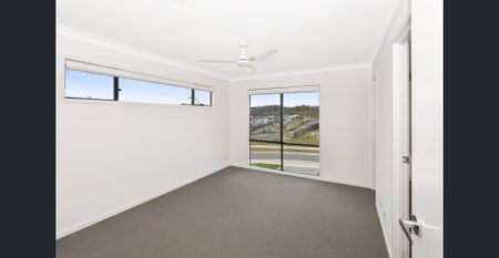 Two-Storey Home with Several Living Spaces and Air-Conditioning - Photo 5