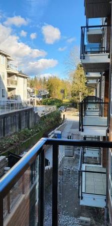 Brand-New 2-Bedroom with EV Charger in Maple Ridge’s Podium - Photo 1