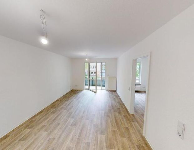 Geräumige 2-Raum-Wohnung mit Balkon - Foto 1