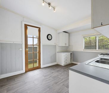 CENTRALLY LOCATED 3 BEDROOM HOME - Photo 1