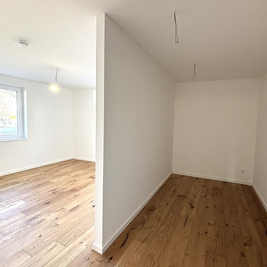 Helle 3-Zimmer-Neubauwohnung mit Terrasse, moderner Einbauküche & Pkw-Stellplatz - Foto 1